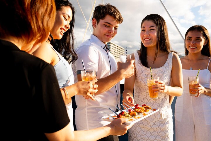 NYC Sunset Cruise: Comedy, DJ & Statue Views!